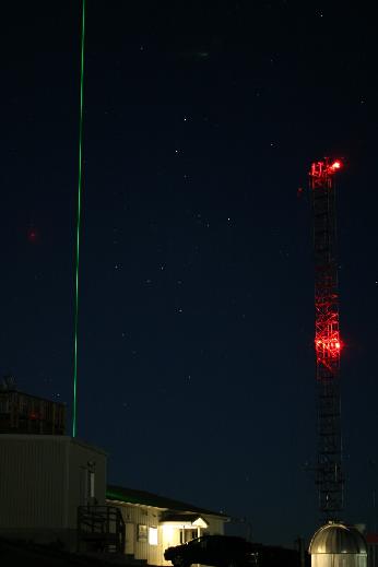 The Mauna Loa Observatory lidar probes the stratosphere on 5 December 2006. Photograph by Forrest M. Mims III.
